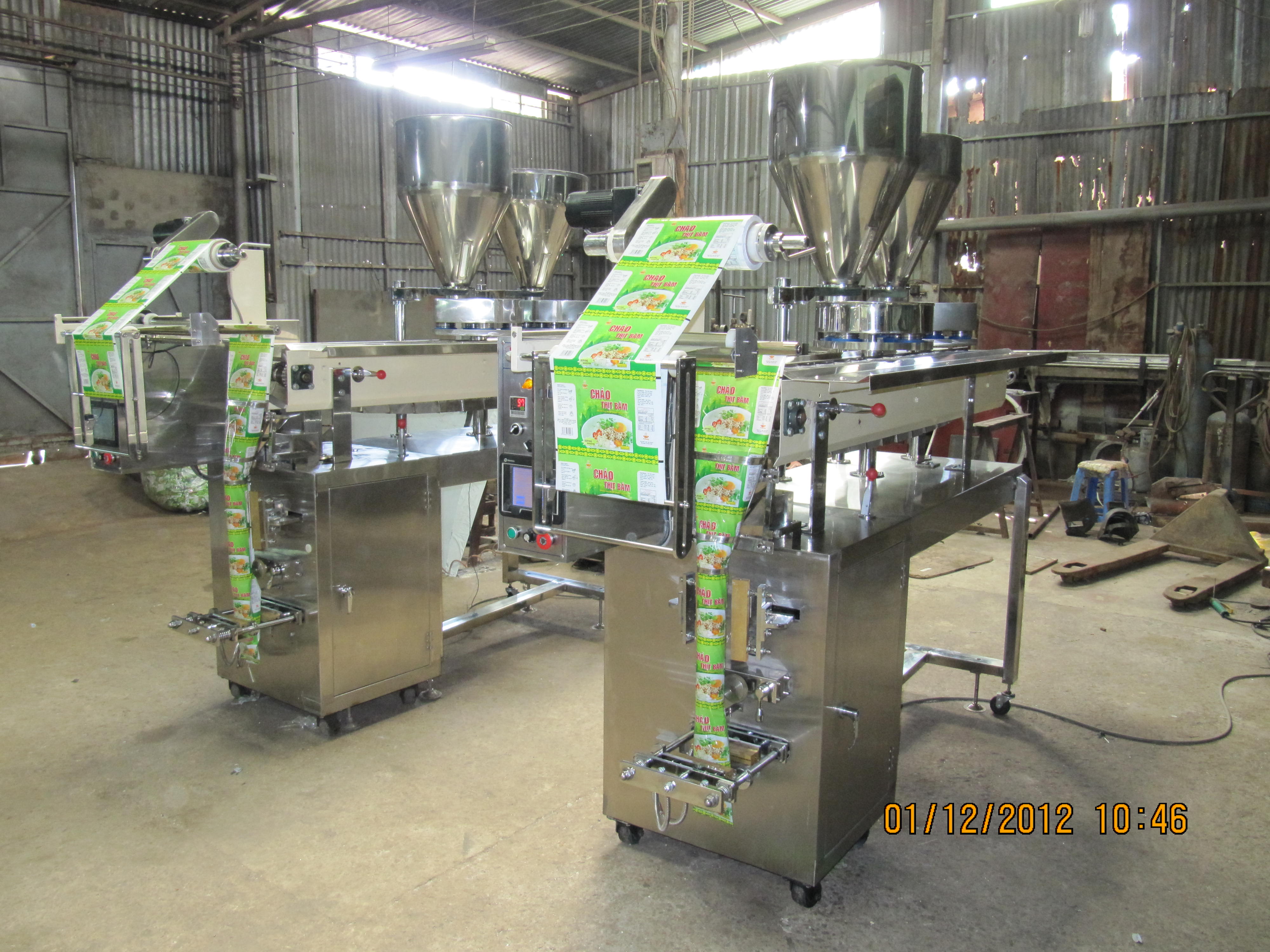 Thiet Bi Dien - Thiet Bi Nhiet - Máy đóng gói cháo 2 mâm 